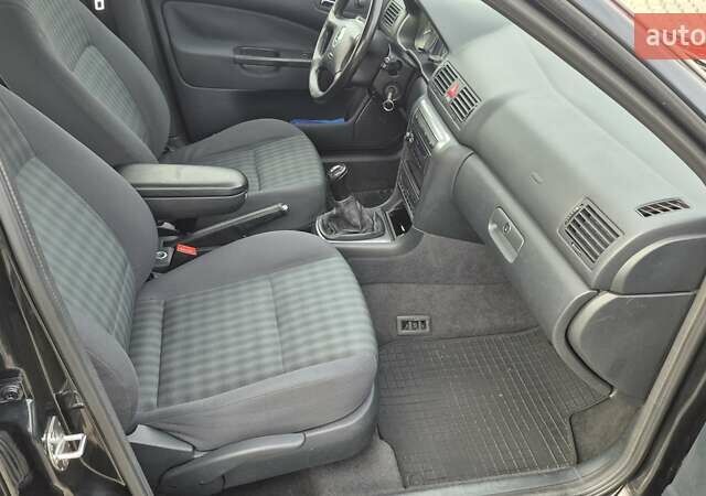 Черный Шкода Октавия, объемом двигателя 1.6 л и пробегом 217 тыс. км за 5700 $, фото 24 на Automoto.ua