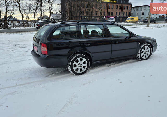 Черный Шкода Октавия, объемом двигателя 1.6 л и пробегом 217 тыс. км за 5800 $, фото 9 на Automoto.ua