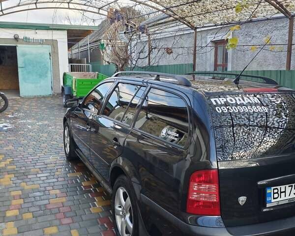 Черный Шкода Октавия, объемом двигателя 1.6 л и пробегом 158 тыс. км за 5200 $, фото 4 на Automoto.ua