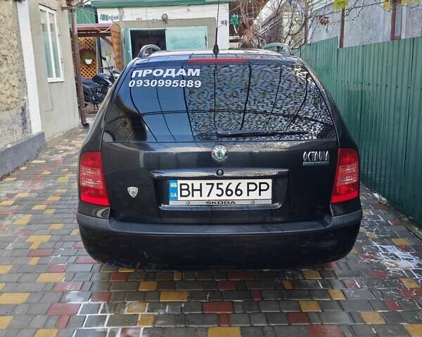 Черный Шкода Октавия, объемом двигателя 1.6 л и пробегом 158 тыс. км за 5200 $, фото 2 на Automoto.ua