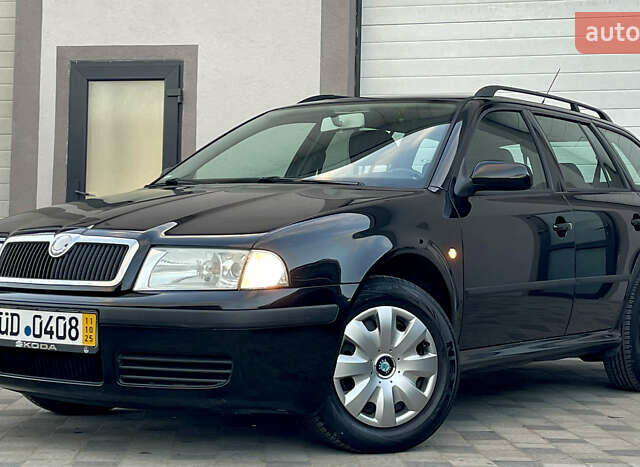 Черный Шкода Октавия, объемом двигателя 1.6 л и пробегом 169 тыс. км за 5850 $, фото 5 на Automoto.ua