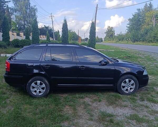 Черный Шкода Октавия, объемом двигателя 1.6 л и пробегом 252 тыс. км за 5800 $, фото 2 на Automoto.ua