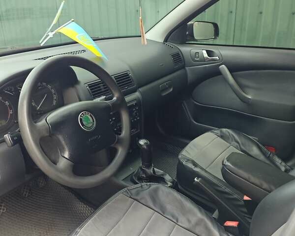 Черный Шкода Октавия, объемом двигателя 1.6 л и пробегом 158 тыс. км за 5200 $, фото 7 на Automoto.ua