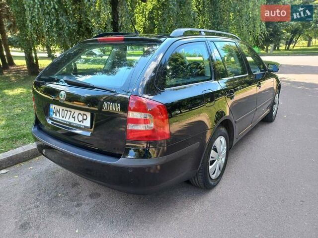 Черный Шкода Октавия, объемом двигателя 1.6 л и пробегом 217 тыс. км за 5750 $, фото 1 на Automoto.ua