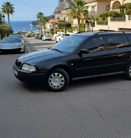 Черный Шкода Октавия, объемом двигателя 1.6 л и пробегом 420 тыс. км за 4900 $, фото 2 на Automoto.ua