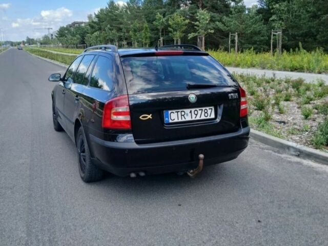 Черный Шкода Октавия, объемом двигателя 2 л и пробегом 257 тыс. км за 2350 $, фото 3 на Automoto.ua