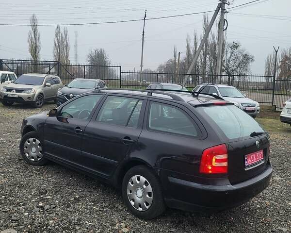 Черный Шкода Октавия, объемом двигателя 1.6 л и пробегом 165 тыс. км за 6750 $, фото 5 на Automoto.ua
