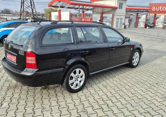 Черный Шкода Октавия, объемом двигателя 1.6 л и пробегом 217 тыс. км за 5700 $, фото 10 на Automoto.ua