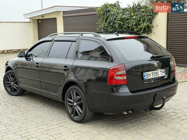 Чорний Шкода Октавія, об'ємом двигуна 2 л та пробігом 197 тис. км за 7400 $, фото 38 на Automoto.ua