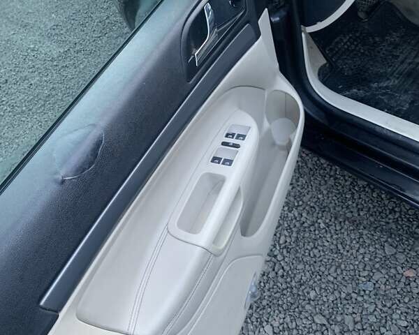 Черный Шкода Октавия, объемом двигателя 1.97 л и пробегом 293 тыс. км за 5600 $, фото 8 на Automoto.ua