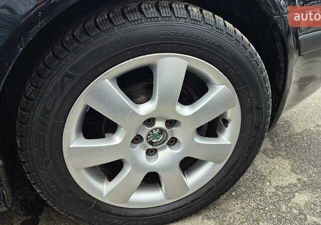 Черный Шкода Октавия, объемом двигателя 1.6 л и пробегом 217 тыс. км за 5700 $, фото 34 на Automoto.ua