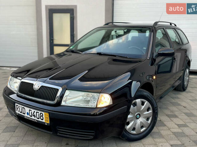 Черный Шкода Октавия, объемом двигателя 1.6 л и пробегом 169 тыс. км за 5850 $, фото 4 на Automoto.ua