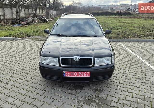 Черный Шкода Октавия, объемом двигателя 1.6 л и пробегом 217 тыс. км за 5700 $, фото 1 на Automoto.ua