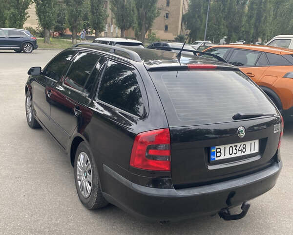Черный Шкода Октавия, объемом двигателя 1.6 л и пробегом 211 тыс. км за 6999 $, фото 3 на Automoto.ua