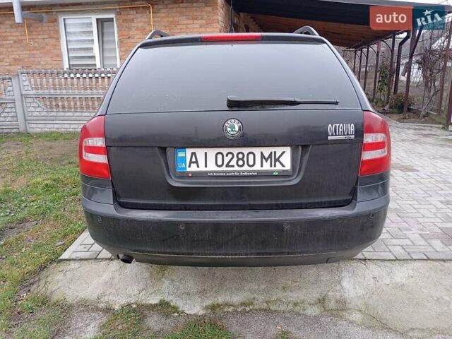 Чорний Шкода Октавія, об'ємом двигуна 1.6 л та пробігом 253 тис. км за 6300 $, фото 1 на Automoto.ua