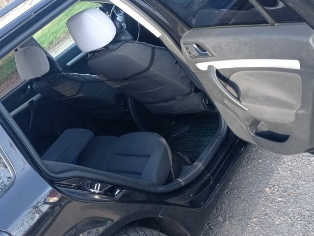 Черный Шкода Октавия, объемом двигателя 1.6 л и пробегом 290 тыс. км за 5300 $, фото 6 на Automoto.ua