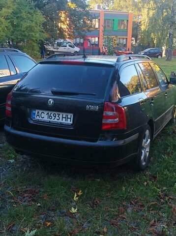 Чорний Шкода Октавія, об'ємом двигуна 2 л та пробігом 259 тис. км за 6400 $, фото 2 на Automoto.ua