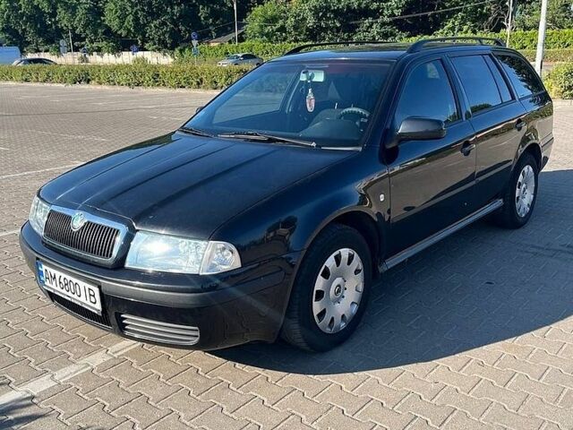 Черный Шкода Октавия, объемом двигателя 1.6 л и пробегом 240 тыс. км за 4500 $, фото 1 на Automoto.ua