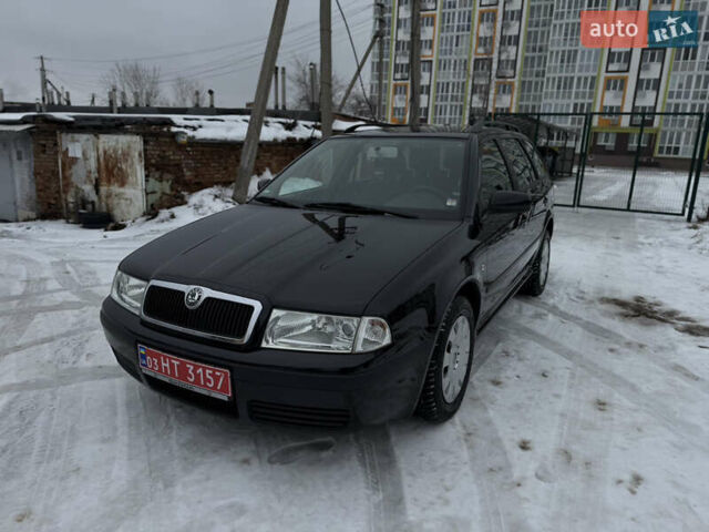 Черный Шкода Октавия, объемом двигателя 1.6 л и пробегом 213 тыс. км за 5999 $, фото 6 на Automoto.ua
