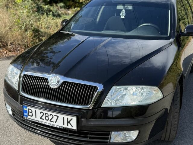 Черный Шкода Октавия, объемом двигателя 1.6 л и пробегом 212 тыс. км за 6500 $, фото 1 на Automoto.ua
