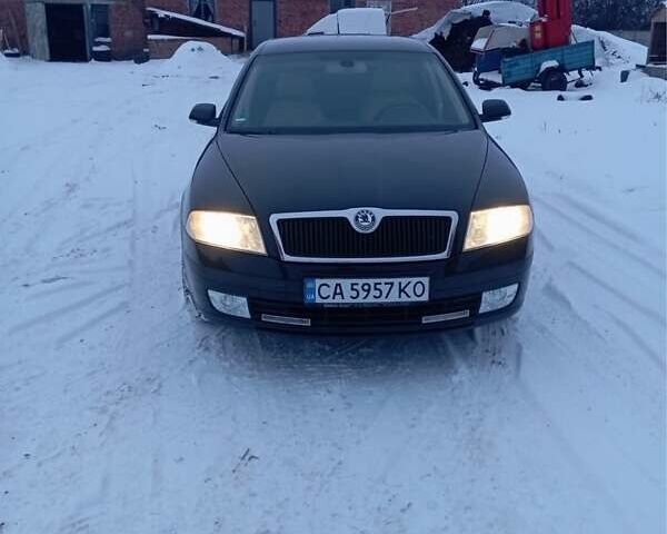 Черный Шкода Октавия, объемом двигателя 1.6 л и пробегом 218 тыс. км за 6200 $, фото 2 на Automoto.ua