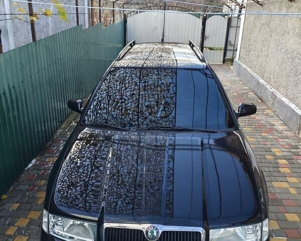 Черный Шкода Октавия, объемом двигателя 1.6 л и пробегом 158 тыс. км за 5200 $, фото 1 на Automoto.ua