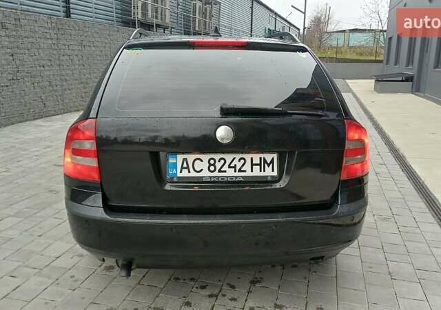 Черный Шкода Октавия, объемом двигателя 1.6 л и пробегом 350 тыс. км за 4800 $, фото 5 на Automoto.ua