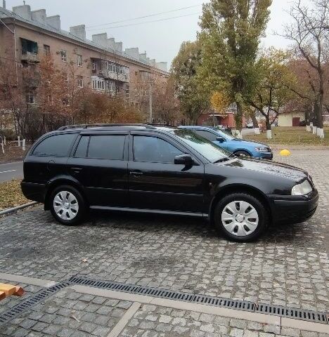Чорний Шкода Октавія, об'ємом двигуна 1.8 л та пробігом 260 тис. км за 5588 $, фото 1 на Automoto.ua