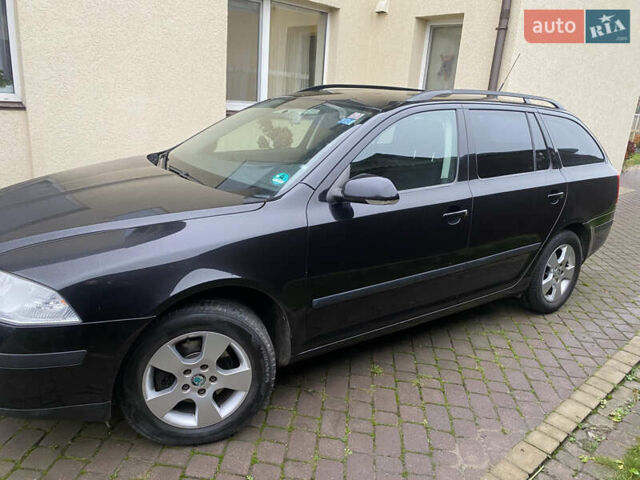 Черный Шкода Октавия, объемом двигателя 1.6 л и пробегом 210 тыс. км за 6500 $, фото 1 на Automoto.ua