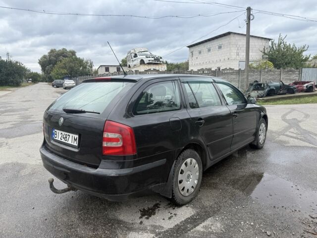 Черный Шкода Октавия, объемом двигателя 1.6 л и пробегом 210 тыс. км за 4550 $, фото 2 на Automoto.ua