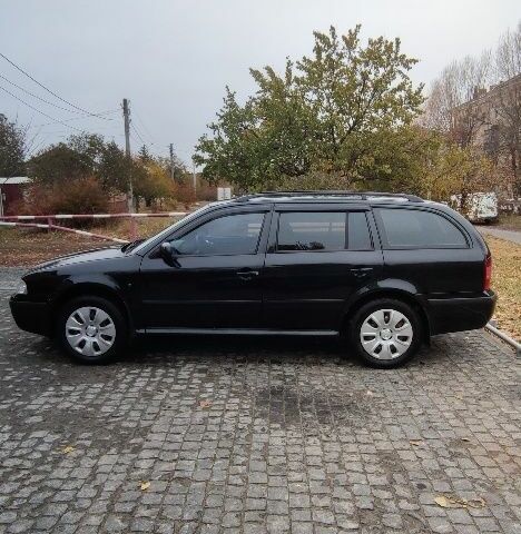 Чорний Шкода Октавія, об'ємом двигуна 1.8 л та пробігом 260 тис. км за 5588 $, фото 2 на Automoto.ua