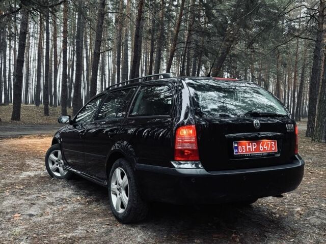 Черный Шкода Октавия, объемом двигателя 1.6 л и пробегом 217 тыс. км за 5999 $, фото 1 на Automoto.ua
