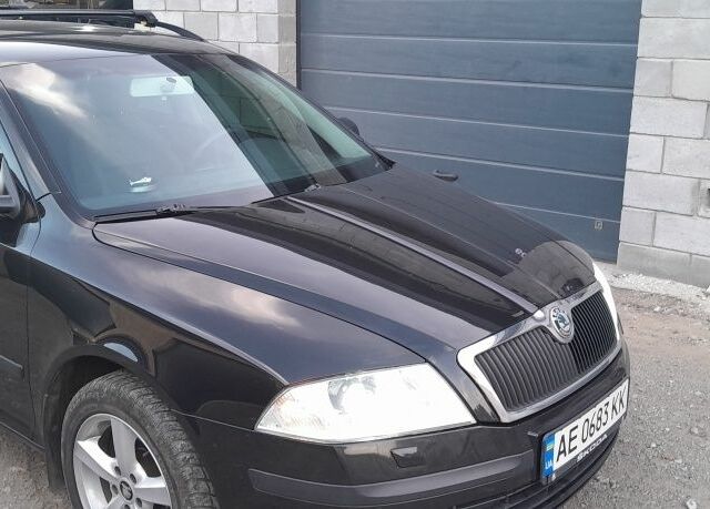 Черный Шкода Октавия, объемом двигателя 1.6 л и пробегом 260 тыс. км за 7400 $, фото 1 на Automoto.ua
