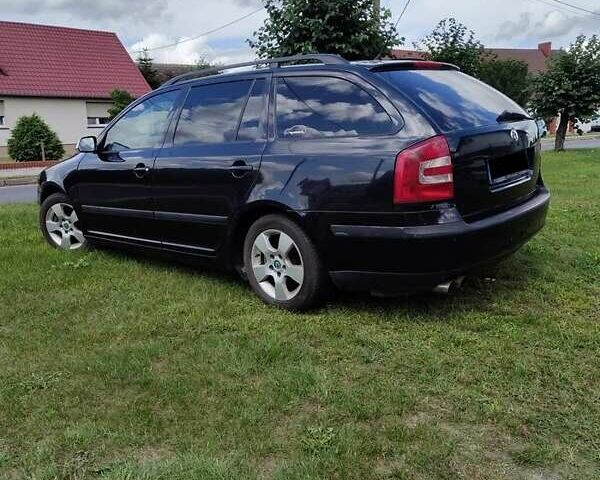 Черный Шкода Октавия, объемом двигателя 2 л и пробегом 234 тыс. км за 8100 $, фото 3 на Automoto.ua