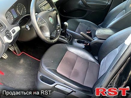 Черный Шкода Октавия, объемом двигателя 2 л и пробегом 239 тыс. км за 6650 $, фото 6 на Automoto.ua