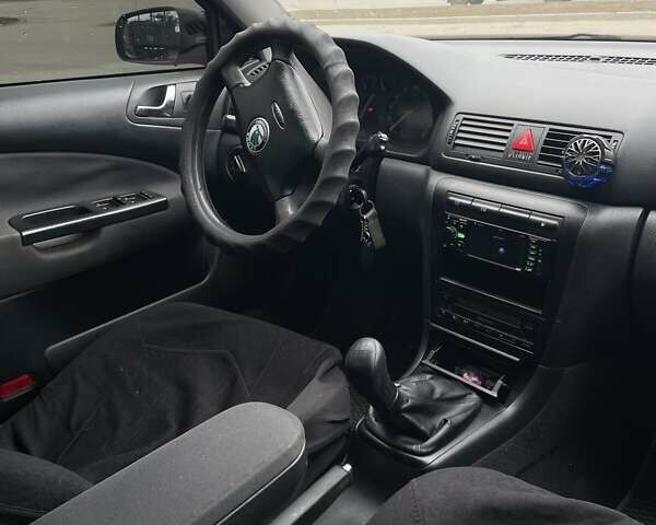 Черный Шкода Октавия, объемом двигателя 1.78 л и пробегом 303 тыс. км за 5000 $, фото 7 на Automoto.ua