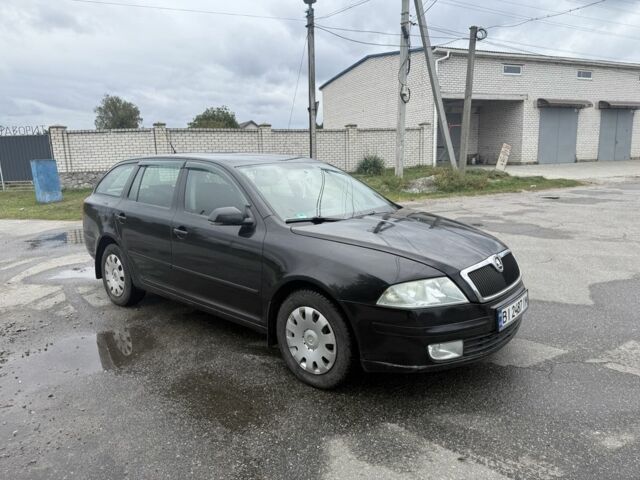 Черный Шкода Октавия, объемом двигателя 1.6 л и пробегом 210 тыс. км за 4550 $, фото 1 на Automoto.ua