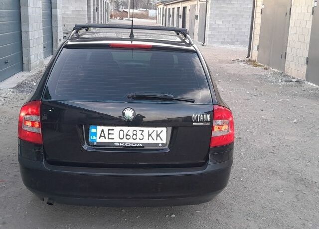 Черный Шкода Октавия, объемом двигателя 1.6 л и пробегом 260 тыс. км за 7400 $, фото 4 на Automoto.ua