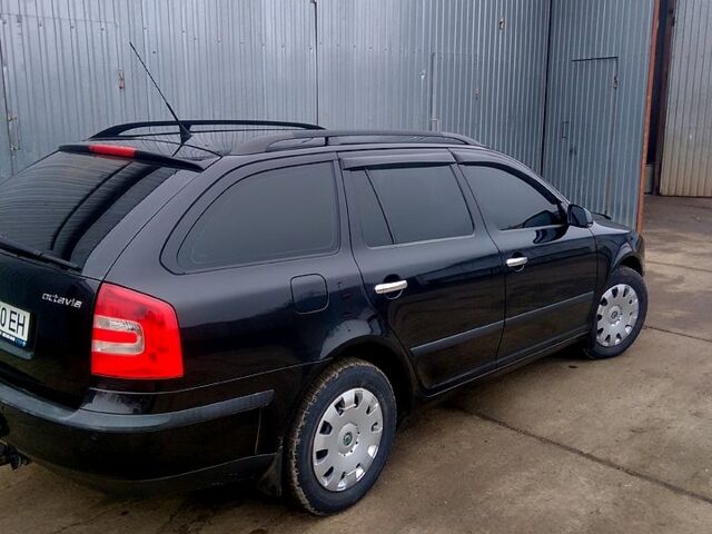 Черный Шкода Октавия, объемом двигателя 1.6 л и пробегом 225 тыс. км за 6900 $, фото 5 на Automoto.ua