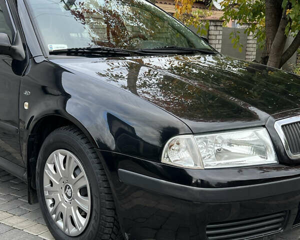 Шкода Октавия 2006 в Черкассах на Automoto.ua Черный Шкода Октавия, объемом двигателя 1.6 л и пробегом 211 тыс. км за 5500 $, фото 6 на Automoto.ua