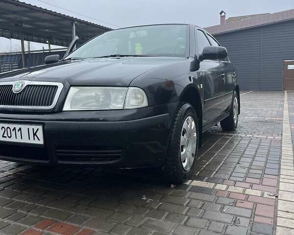 Черный Шкода Октавия, объемом двигателя 1.8 л и пробегом 343 тыс. км за 5550 $, фото 2 на Automoto.ua