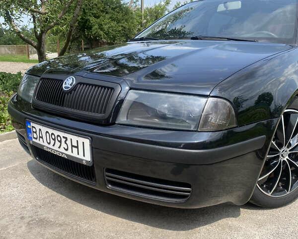 Черный Шкода Октавия, объемом двигателя 1.8 л и пробегом 292 тыс. км за 5000 $, фото 1 на Automoto.ua