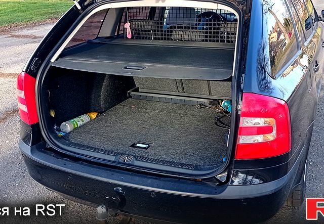 Черный Шкода Октавия, объемом двигателя 1.6 л и пробегом 290 тыс. км за 6500 $, фото 4 на Automoto.ua