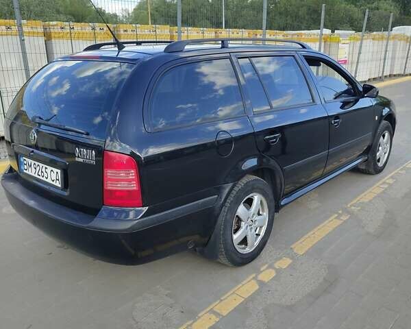 Черный Шкода Октавия, объемом двигателя 1.78 л и пробегом 314 тыс. км за 5300 $, фото 1 на Automoto.ua