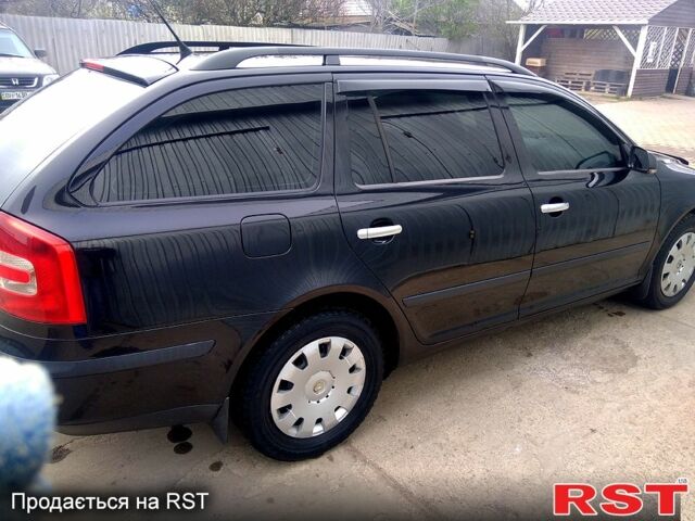 Черный Шкода Октавия, объемом двигателя 1.6 л и пробегом 225 тыс. км за 6900 $, фото 1 на Automoto.ua