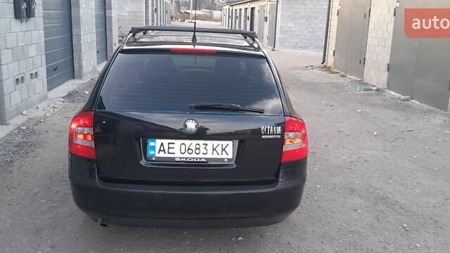 Черный Шкода Октавия, объемом двигателя 1.6 л и пробегом 260 тыс. км за 7400 $, фото 2 на Automoto.ua