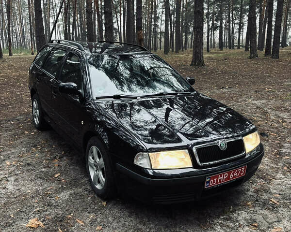 Черный Шкода Октавия, объемом двигателя 1.6 л и пробегом 217 тыс. км за 5999 $, фото 2 на Automoto.ua