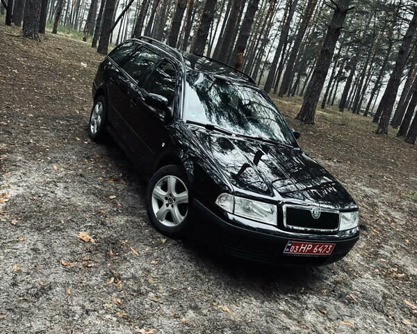 Черный Шкода Октавия, объемом двигателя 1.6 л и пробегом 217 тыс. км за 5999 $, фото 34 на Automoto.ua