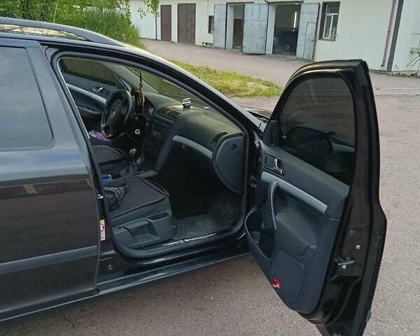 Черный Шкода Октавия, объемом двигателя 1.6 л и пробегом 249 тыс. км за 6300 $, фото 10 на Automoto.ua