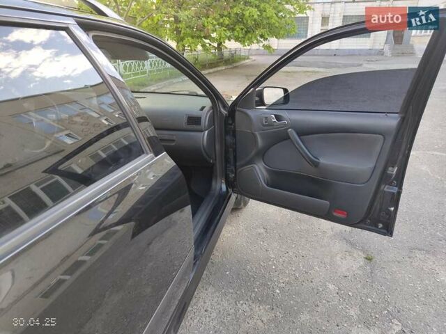 Черный Шкода Октавия, объемом двигателя 1.78 л и пробегом 314 тыс. км за 5300 $, фото 8 на Automoto.ua